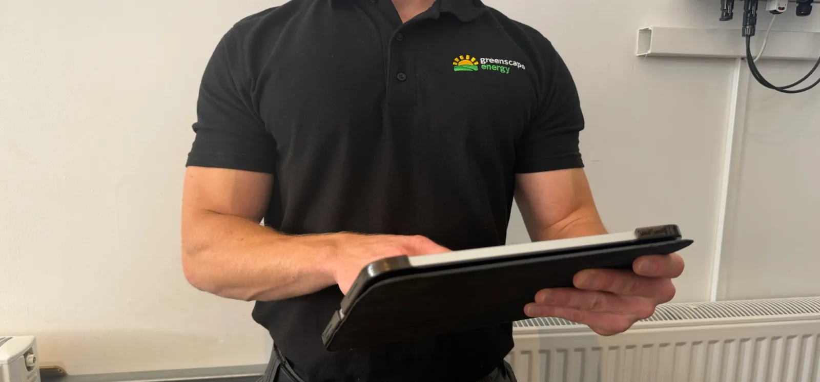 Renewable Energy Specialist surveying a property
