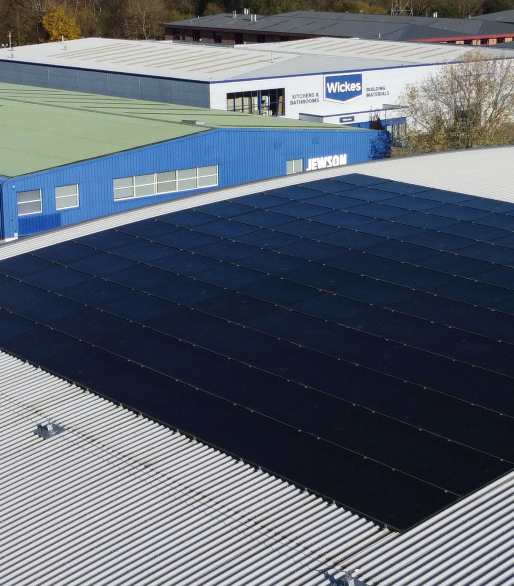 A farm building with a solar array on its roof